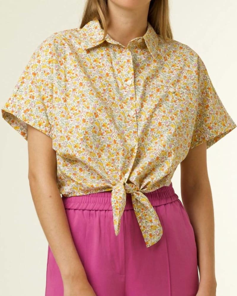 Front of a model wearing a size Large Candys Floral Print Tie Waist Shirt in Multi in Multi by FRNCH. | dia_product_style_image_id:332454